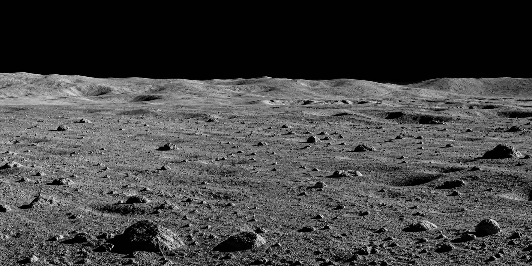 A wide lunar landscape with regolith, rocks, and a low rolling horizon